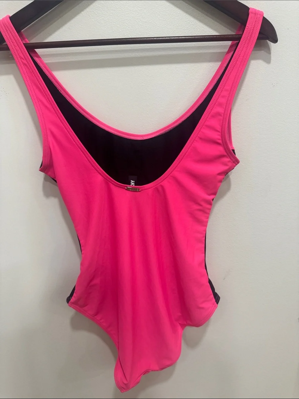 Flattering Neon DKNY Black and Hot Pink One piece swimsuit with Ruching - Picture 3 of 4